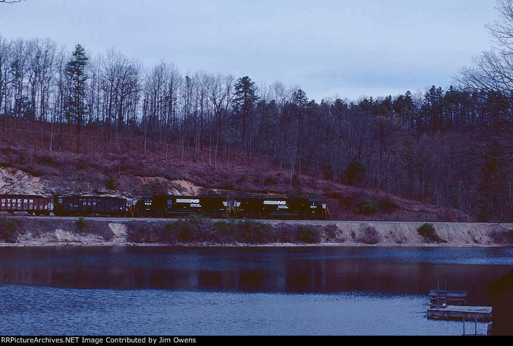 Train #172 drops down the grade from Zirconia to the Lake Summit bridge. This is just west of Saluda.