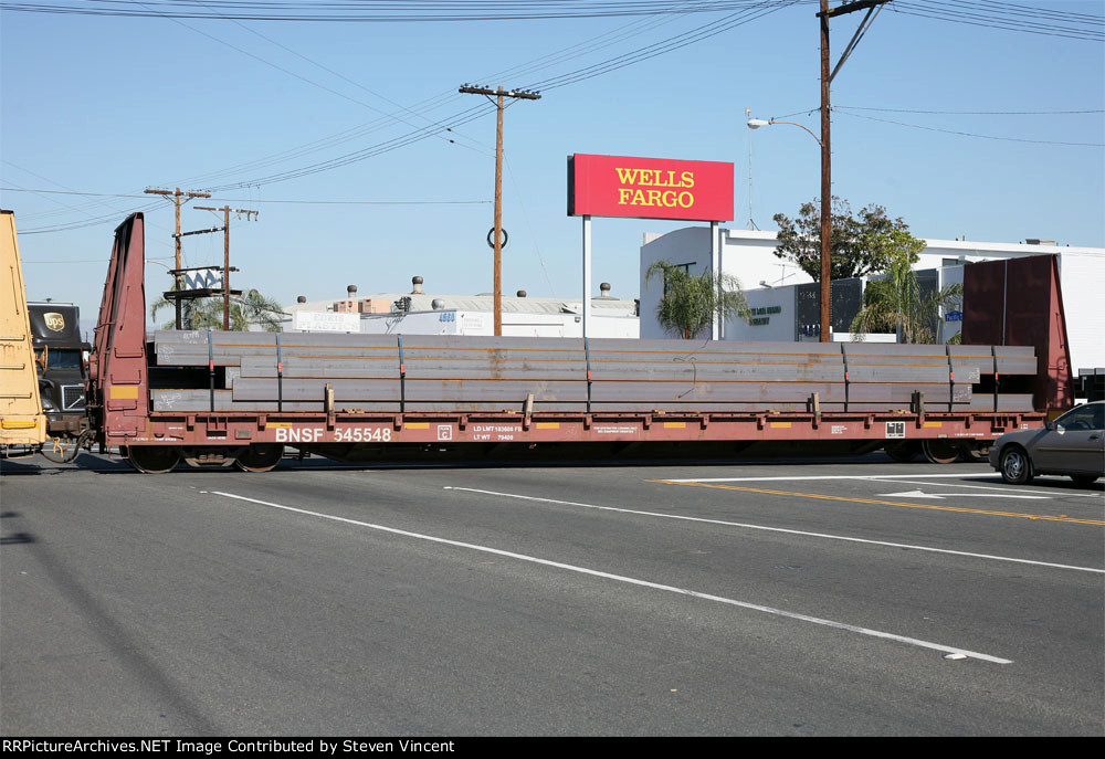 BNSF bulkhead flat with steel load #545548, ex BN