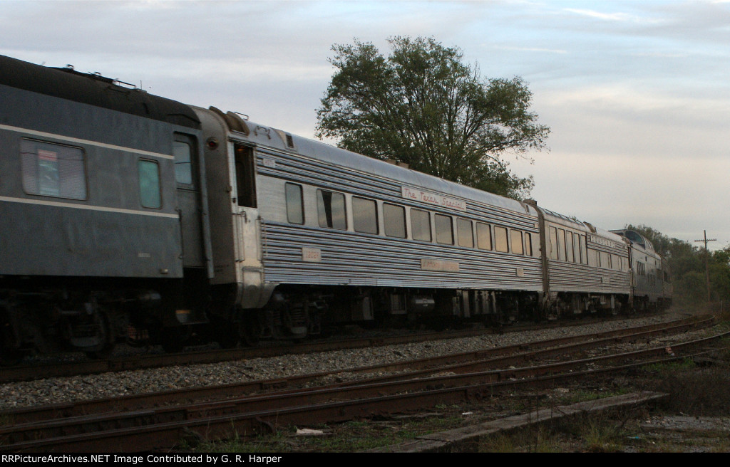 Speeding deadhead excursion train kicks up a little dust as it passes through Crozet, VA
