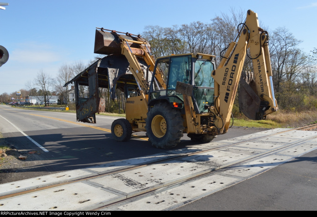 The cab makes it way through the crossing.