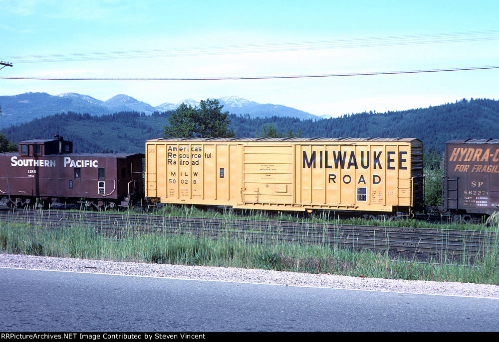 SP local with Milwaukee Road box #50028