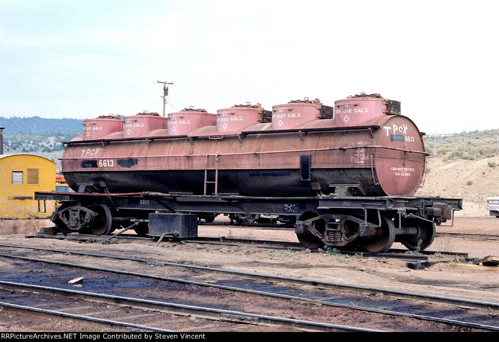 Marked TPCX, ex SHPX 6613 an ACF six dome tank that had been used in wine service. Here serving at the Weyerhaeuser Sycan shop as a storage tank.