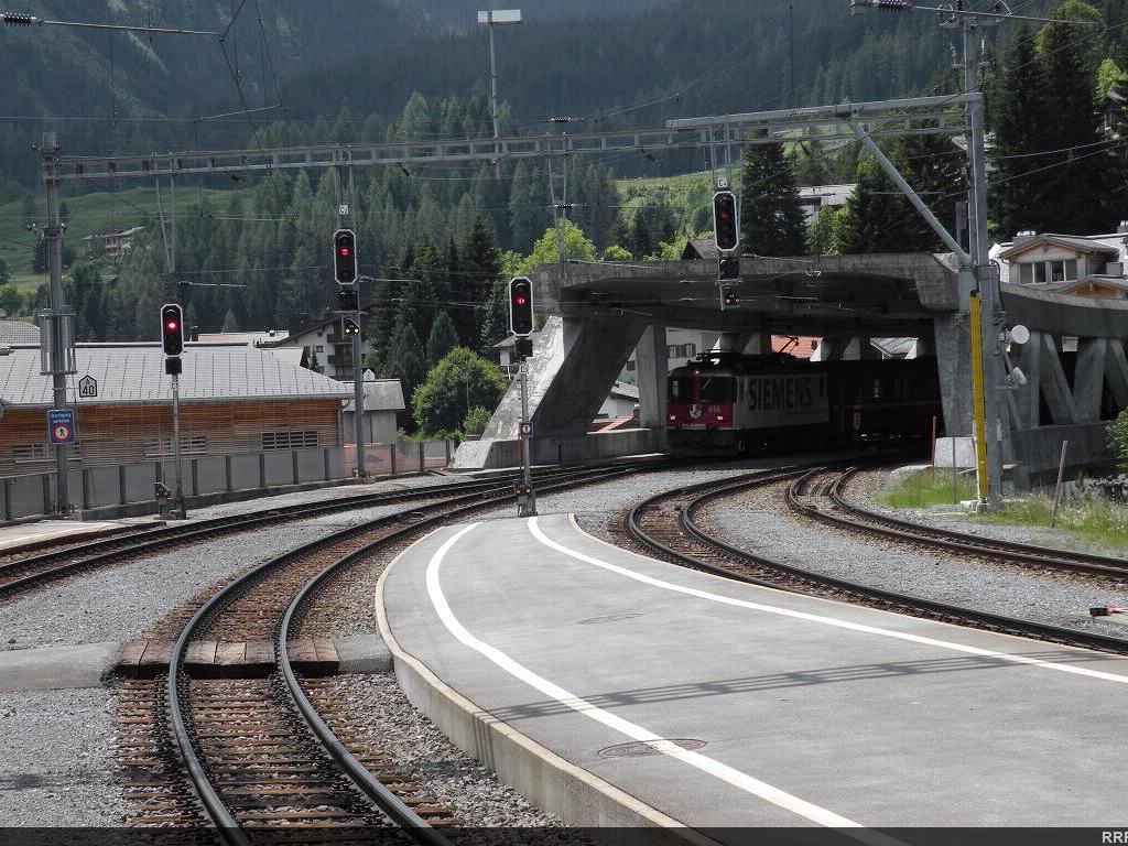 A train window view of the bridge/ tunnel portal at Klosters. 