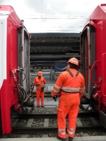 Coupling the Davos section of the Glacier Express to the St Moritz section for the next leg to Disentis/Mustér. 