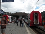 The passengers of both a St Moritz bound and a Zermatt bound (my train) Glacier Express stretching their legs and taking in the scene. 