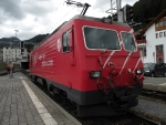 Rack (cog) equipped Hge 4/4 II of the MGB backing onto the Glacier Express.