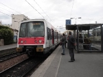 Paris commuter train the form of Class Z8100 EMU arriving at Le Bourget station.