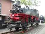 Meter gauge steam engine 99 1562-0 on a flatcar.