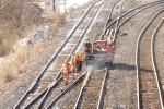 CN MOW adjusting a frog by heating rail