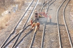 CN MOW adjusting a frog. Working the rail with spike mauls & sledgehammer
