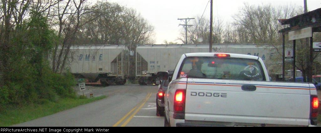 DME 49165, the 2nd of 2 DME covered hoppers in a northbound mixed freight,