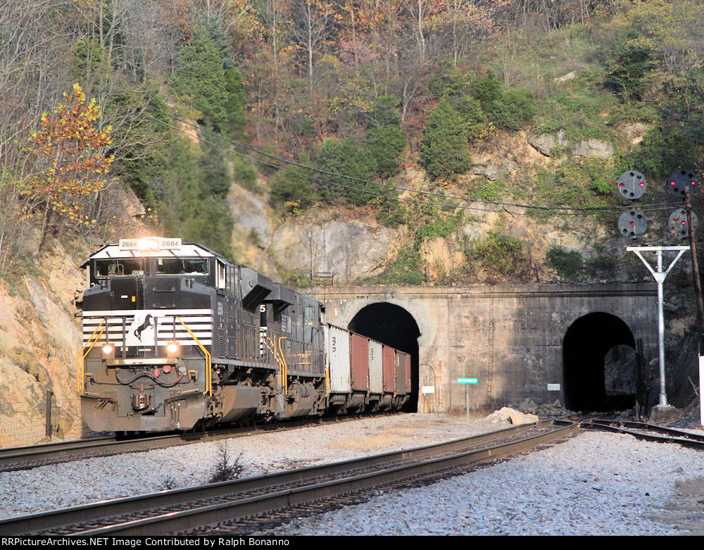 NS 2684 leads an empty hopper train, about the ONLY time the sun  was out when a train approached, at montgomery tunnel