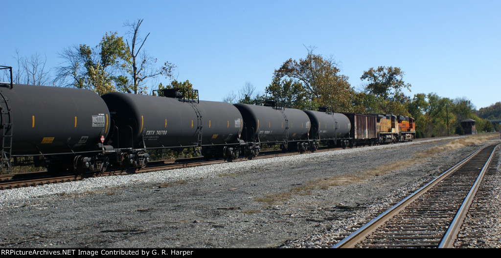 CBTX 742738 and others in a going-away shot of the K08222 right at the site of the April 30, 2014, oil train derailment