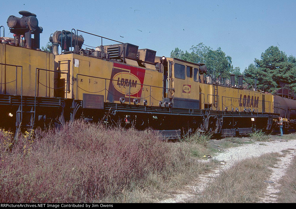 A LORAM rail grinding train paked for the night.