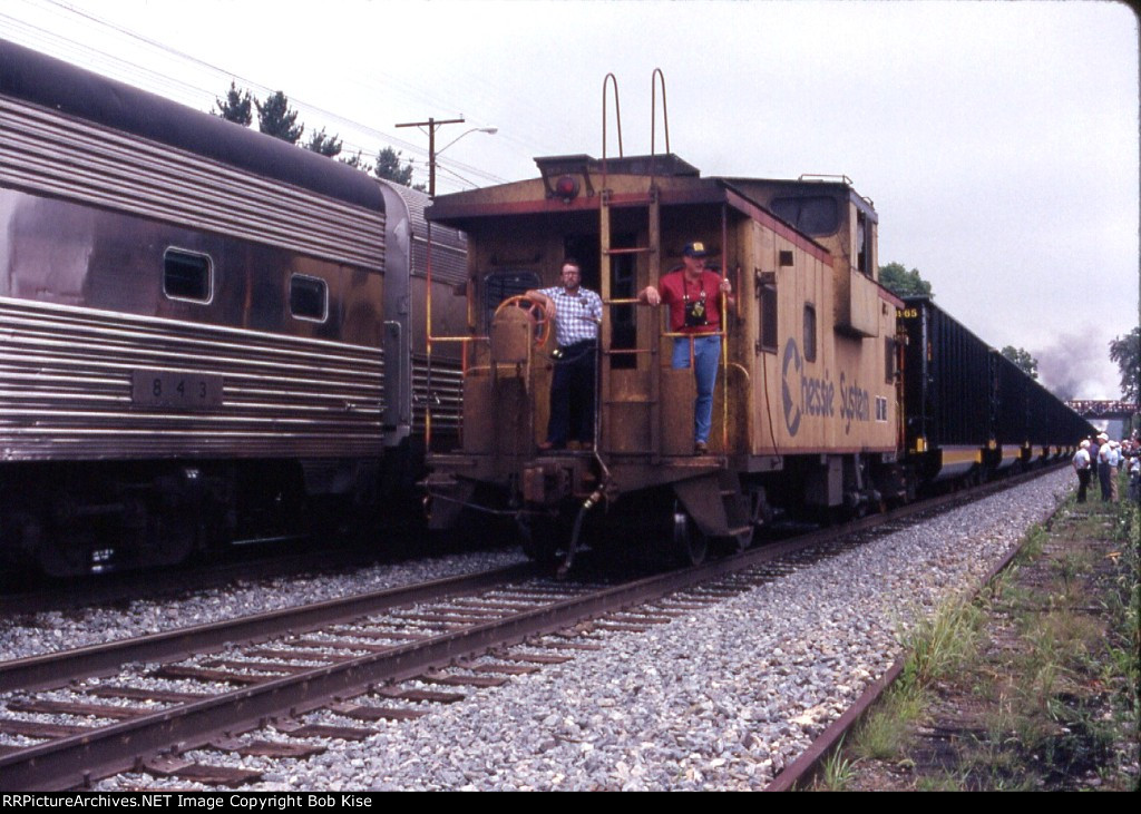 A nice C&O caboose on the hopper train