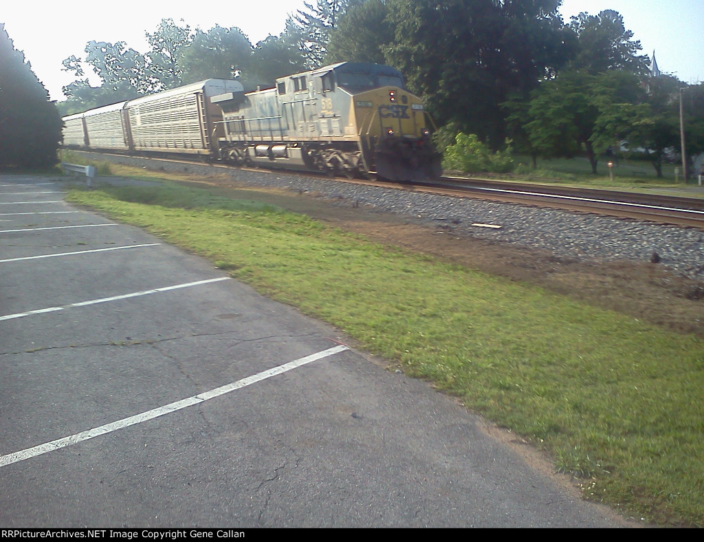 CSX 518 leads an autoreack train through Kingston, Ga.