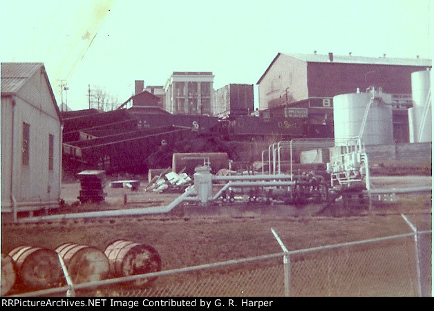Derailed empty hopper cars across from the Western State Hospital