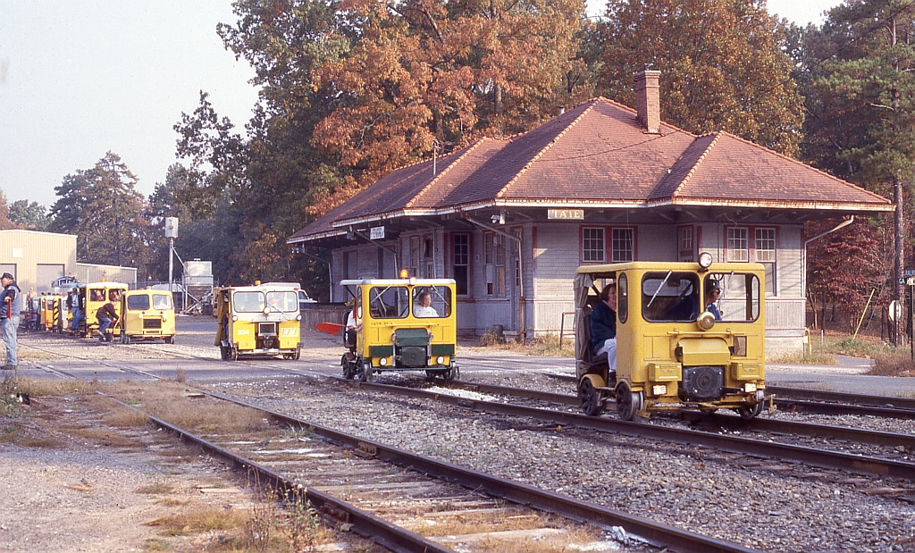 Various speeders being flag by the depot