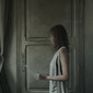 Girl reading at an open window no.2