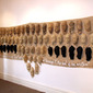 Memory of Fire - Genesis, 66 hessian heads mounted on hessian, 2007 Wellington NZ