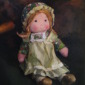 PAINTING OF A DOLL