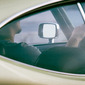 man in green car on mo-pac austin, tx
