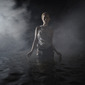 Women appearing from mist in sea