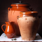 Still life on three large earthen jars