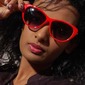 woman with red sunglasses