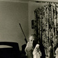 Dad with Gun and Religious Statues