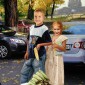 Moldovan children earn money for school. Street vendors of corn.