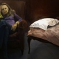  woman sitting in a velvet arm-chair next to a velvet sofa