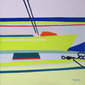 Green boat with orange sail on deck