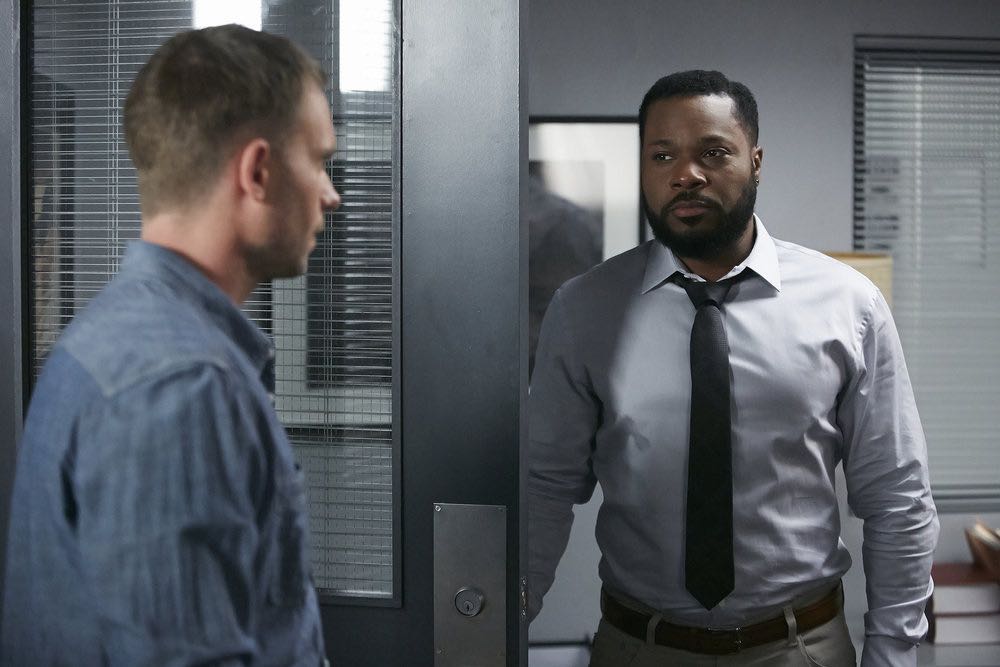 SUITS -- "Trust" Episode 605 -- Pictured: Malcolm-Jamal Warner as Julius Rowe -- (Photo by: Ian Watson/USA Network)