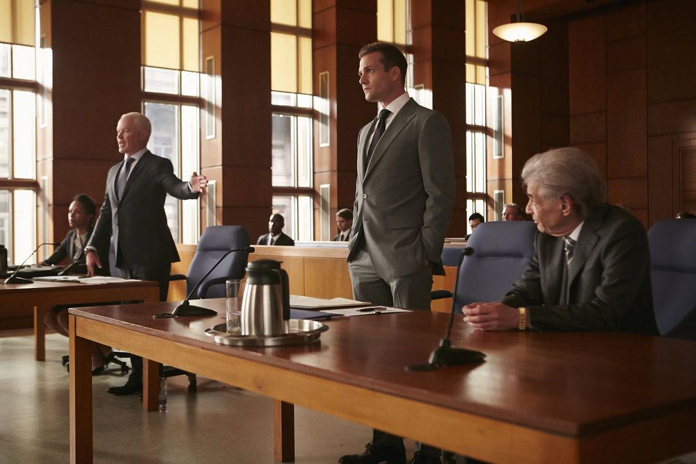 SUITS -- "Trust" Episode 605 -- Pictured: (l-r) Neal McDonough as Sean Cahill, Gabriel Macht as Harvey Specter, Alan Rosenberg as William Sutter -- (Photo by: Ian Watson/USA Network)