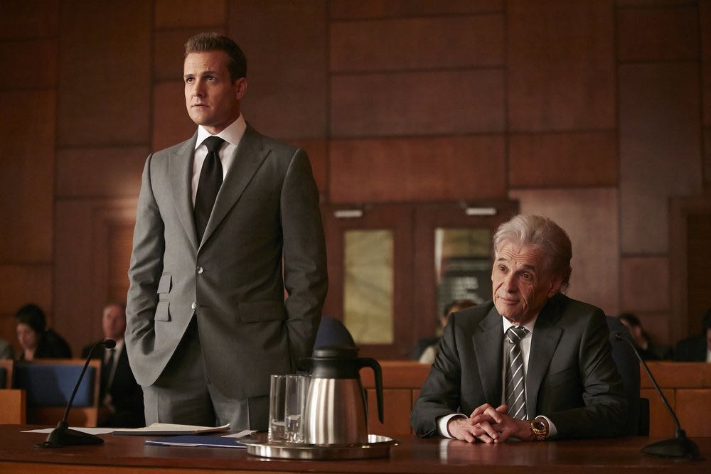 SUITS -- "Trust" Episode 605 -- Pictured: (l-r) Gabriel Macht as Harvey Specter, Alan Rosenberg as William Sutter -- (Photo by: Ian Watson/USA Network)