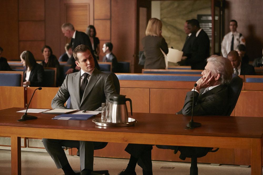SUITS -- "Trust" Episode 605 -- Pictured: (l-r) Gabriel Macht as Harvey Specter, Alan Rosenberg as William Sutter -- (Photo by: Ian Watson/USA Network)