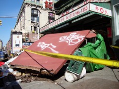 Delivery Truck Demolishes Newsstand on Grand St.
