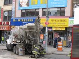 Several Injured After Truck Plows into Six Cars and Storefront Near Manhattan Bridge
