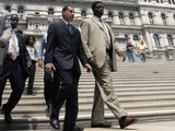 Gov. David Paterson and former aide David Johnson(AP Photo/Mike Groll)