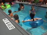 Hundreds Line Up For Dumpster Pools
