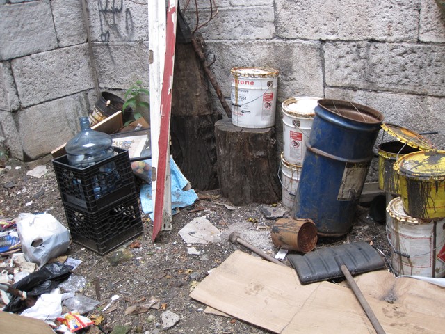 Trash has accumulated inside the gatekeeper's quarters of the Seaman-Drake Arch.