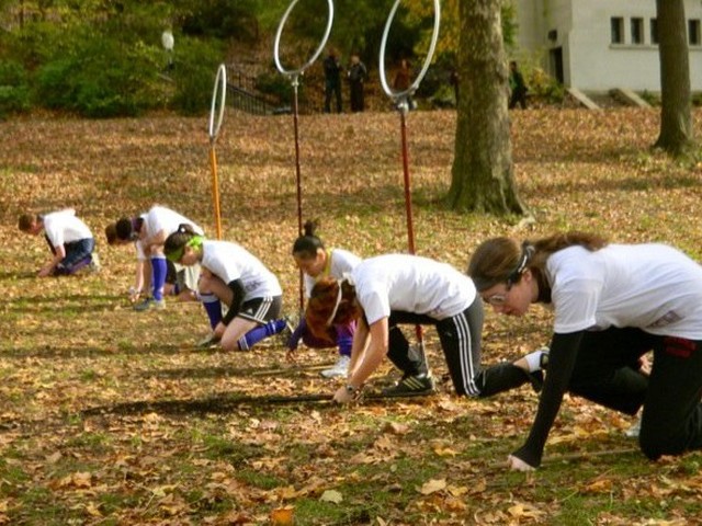 Quidditch players get ready to run.