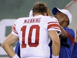Eli Manning Takes Big Hit in Monday Night Game vs. Jets(AP/Bill Kostroun)