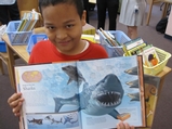 Hundreds of Books Donated to East Village School for Summer Reading Program