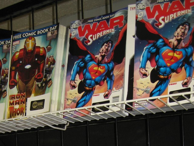 Marvel Comics gave away a free Iron Man comic book (l.) as a way to jump on the promotional bandwagon for 