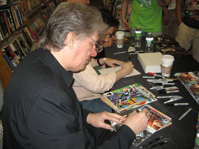 Legendary comic book writer Jim Shooter autographs comics for fans on Free Comic Book Day at midtown comic shop Jim Hanley's Universe on 33rd Street.