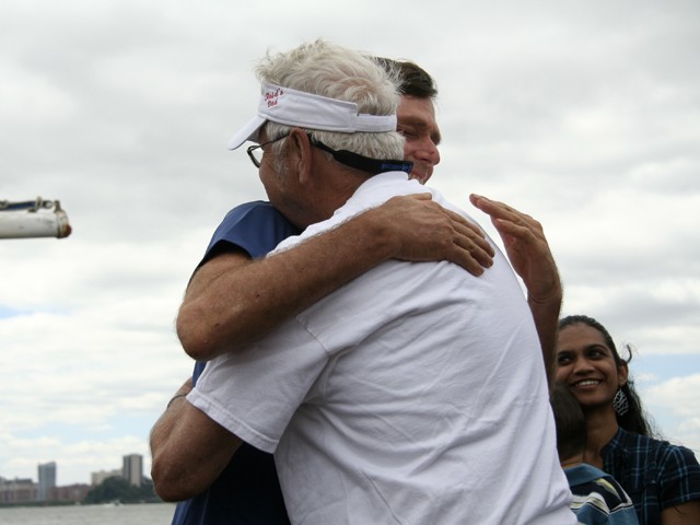 Reid hugs his father after arriving on Pier 81 in Midtown.