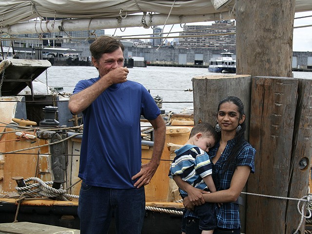 Reid is reunited with his wife, Soanya Ahmad, and meets his son, Darshen, for the first time.