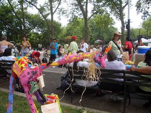 Crowds (and giraffes) gathered at the Sunken Playground in Highbridge Park.